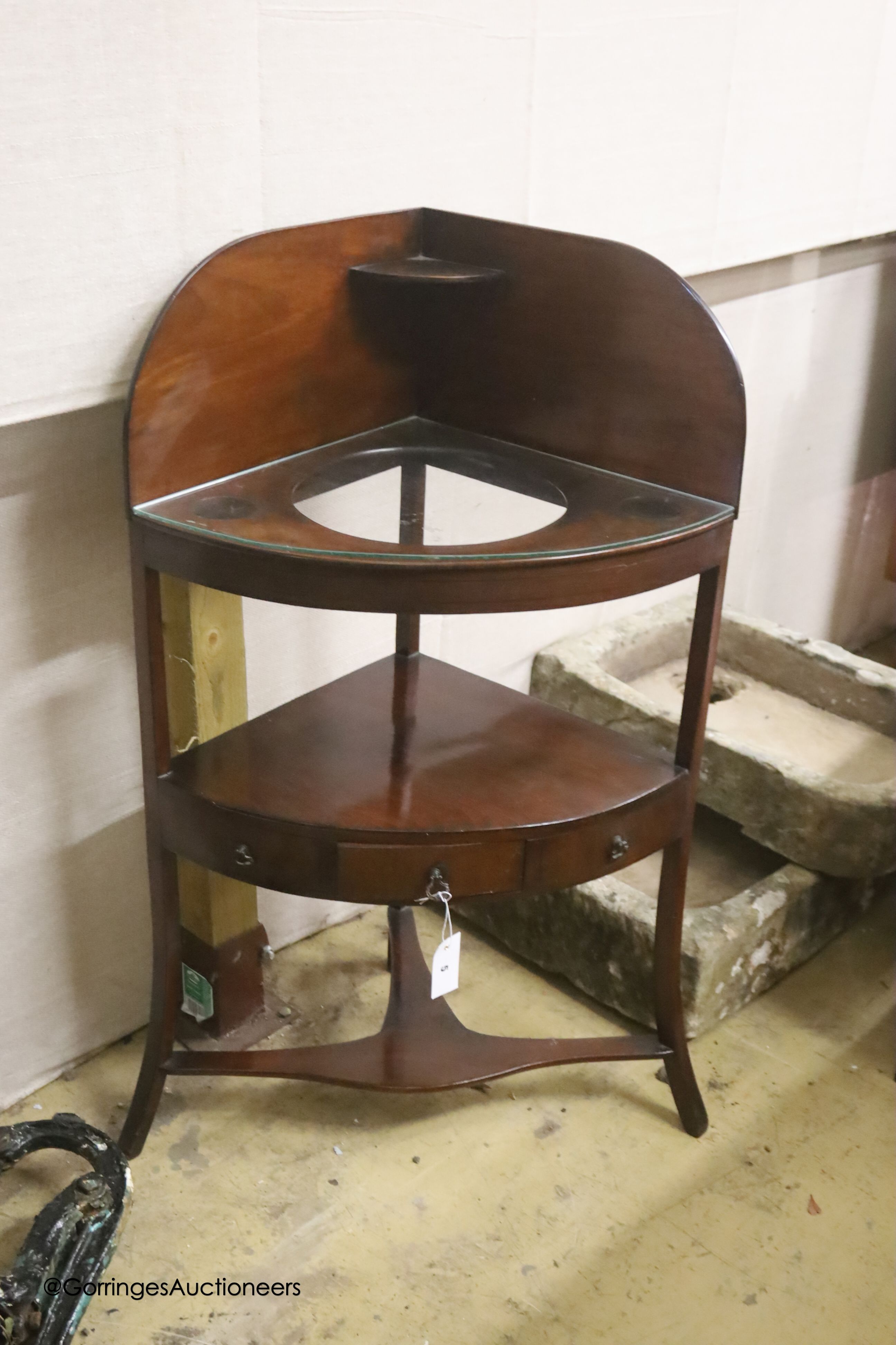 A George III mahogany two tier corner washstand, width 61cm, depth 42cm, height 106cm together with a reproduction mahogany three tier wall bracket